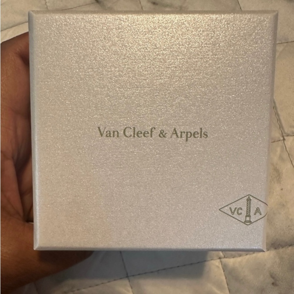 This is an authentic Van Cleef and Arpels jewelry box.